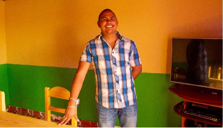 A former migrant worker in the home he built in Madagascar from his hard work in Mauritius.