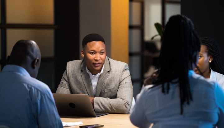 Buisness people at round table. Fintech Africa