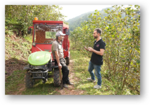 Hazelnut farmer Yilmaz with ofi agronomist Murat Arslan